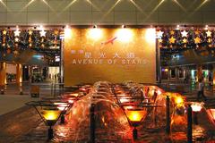 Avenue of Stars in Hong Kong with city skyline and Victoria Harbour