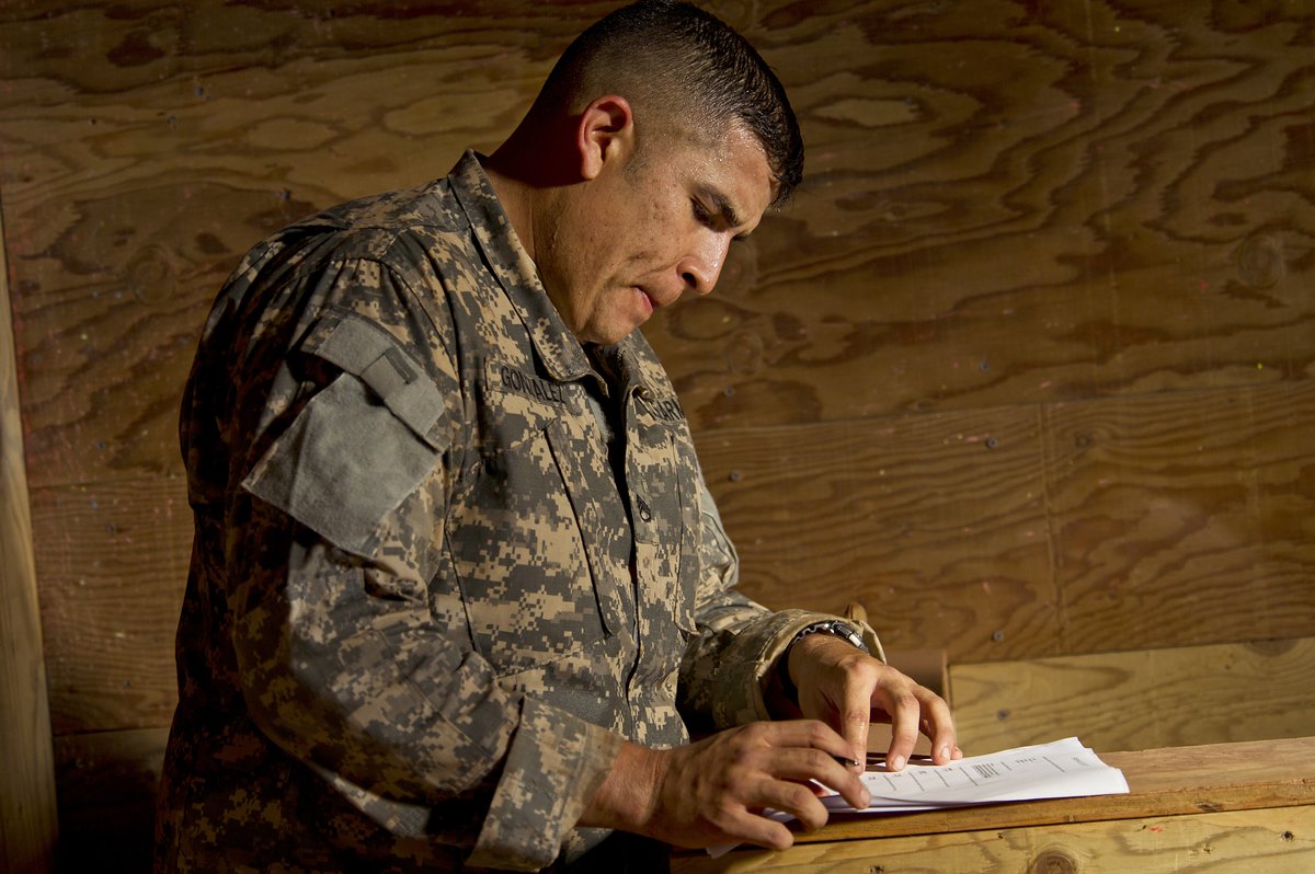 U.S. Army Staff Sgt. Tony Gonzalez taking medical knowledge test during 2012 Pacific Regional Medical Command Best Medic Competition