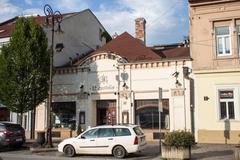 Building of a restaurant on the Main Street in Kosice with red roof and outdoor seating area