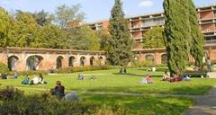 Cloister of the University of Toulouse Capitole with arched walkways and classical architecture