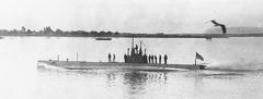 USS F-2 submarine docked in water in 1912