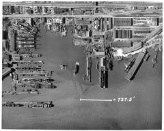 Aerial view of Bethlehem Union Iron Works shipyard in 1943 showing ships under construction and industrial buildings