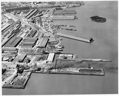 Aerial view of Bethlehem Union Iron Works shipyard in 1943 with ships and industrial structures