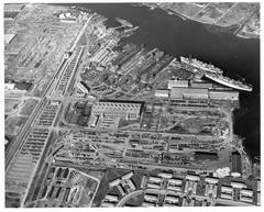 Aerial view of Bethlehem Alameda shipyard in 1944 with ships and industrial buildings