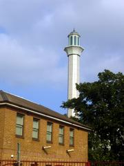 Minaret of the Baitul Futuh Mosque under blue sky