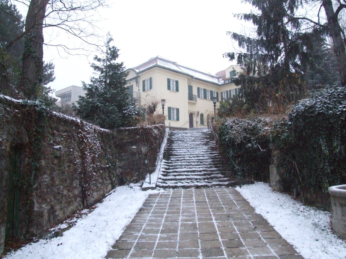 Entrance of Bajor Gizi Actors' Museum with a classic architectural facade and statues