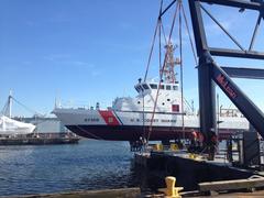 Coast Guard crane lifting the Coast Guard patrol boat Stingray at Baltimore Yard