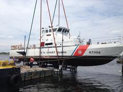 Coast Guard Yard crane lifting Coast Guard Cutter Chinook out of water for maintenance