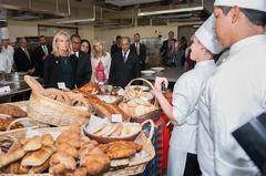 Culinary students and teachers from San Ignacio de Loyola University presenting recipes to Dr. Jill Biden and Ambassador Nichols in Lima, Peru