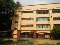 Mehan Garden near Universidad de Manila in Ermita, City of Manila with surrounding urban landscape and pedestrian areas