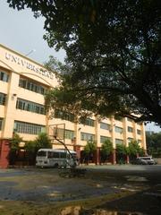 Mehan Garden and Universidad de Manila in Ermita, Manila with historic buildings and well-maintained garden