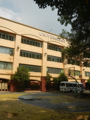 Mehan Garden and Universidad de Manila in Ermita, Manila with historical landmarks and urban surroundings