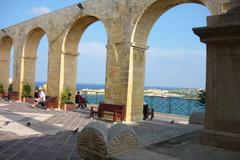 Upper Barrakka Garden panoramic view with Victoria Harbour and historical fortifications