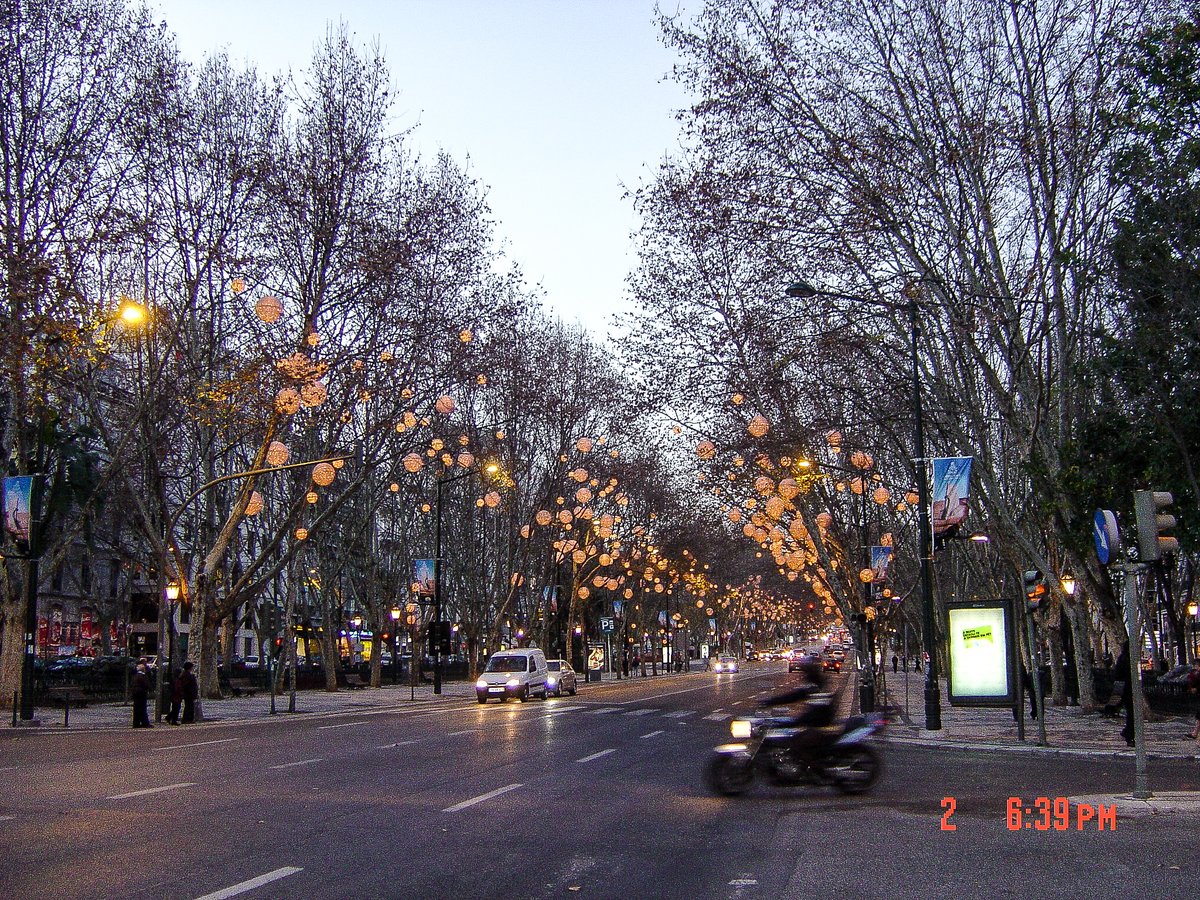 Avenida da Liberdade, main street in Lisbon, Portugal with cars and pedestrians