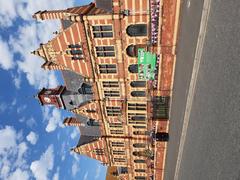 Interior view of Victoria Baths in Manchester showcasing historic architecture and tiled walls under natural light