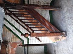 Interior view of Victoria Baths with ornate architecture and large windows in Manchester, England