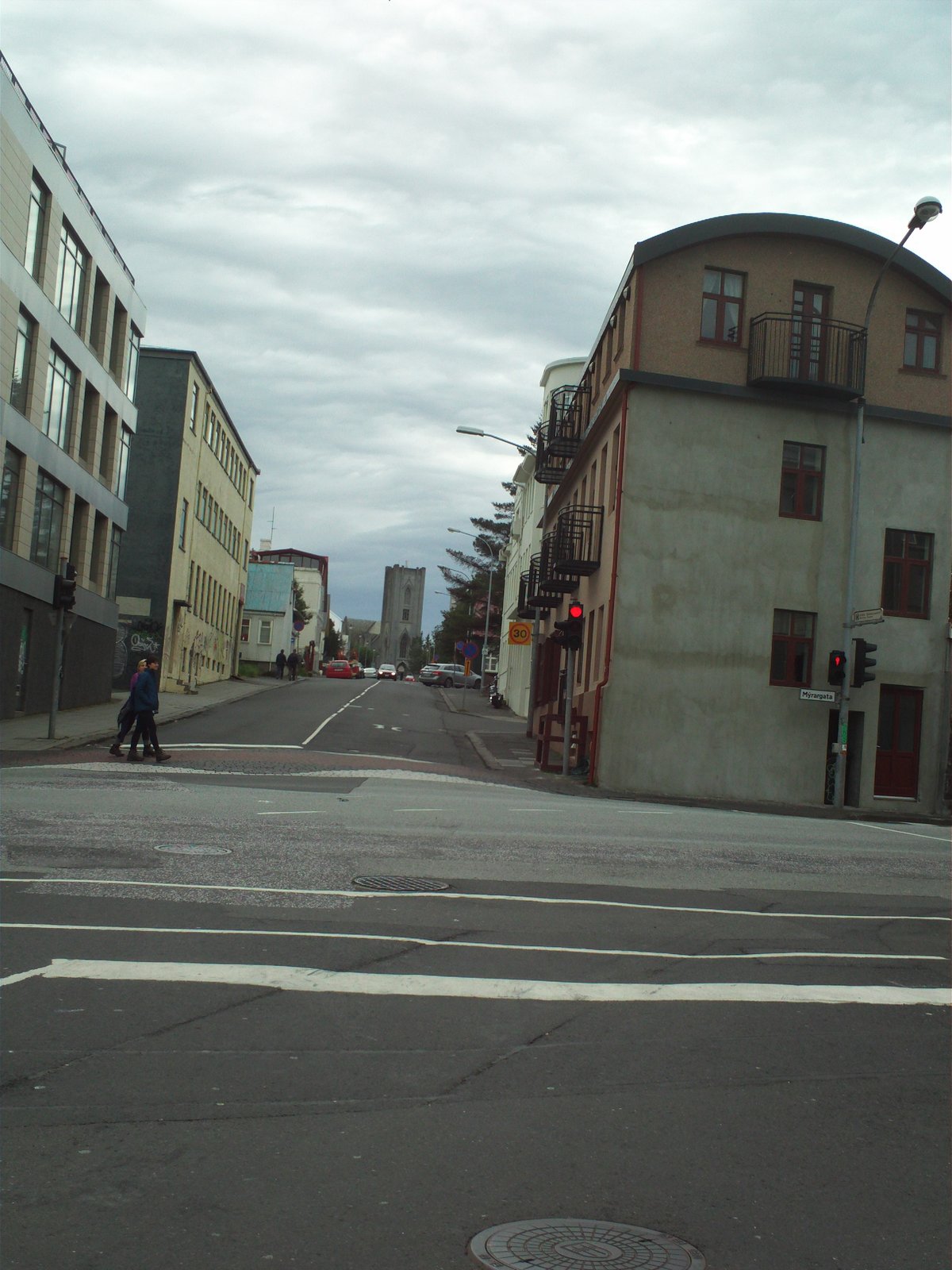 View along Ægisgata street towards Reykjavik's Catholic church on a cloudy day