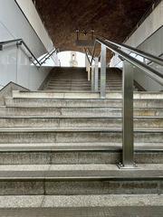 Stairway at Waterloo station with commuters going up and down