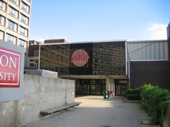 Exterior view of Case Gym at Boston University with modern architectural design and clear blue sky