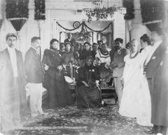 Queen Liliuokalani and Hawaiian royalty mourning at Washington Place as the Hawaii flag is lowered for the last time after annexation