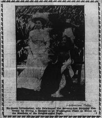 Queen Liliuokalani in regal attire receiving guests at Washington Place in 1909