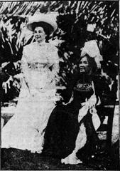 Queen Liliuokalani in regal attire receiving guests at Washington Place in 1909