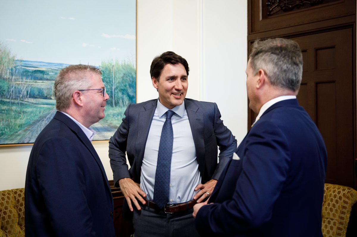 Prime Minister Justin Trudeau meeting Ian Smith and Darren Fisher in office