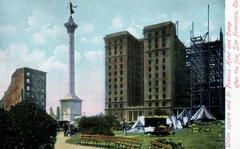 Hotel St. Francis damaged by fire after 1906 earthquake with tents outside