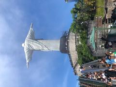 Christ the Redeemer statue close-up view with clear blue sky