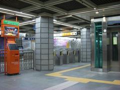 Interior view of Gyeongbokgung Station with modern architecture and signage