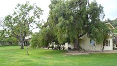 Will Rogers State Historic Park entrance sign