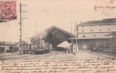 Bologna Centrale railway station in the early 1900s with steam locomotives and historic architecture