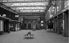Broad Street station concourse interior in 1970 with commuters and signage