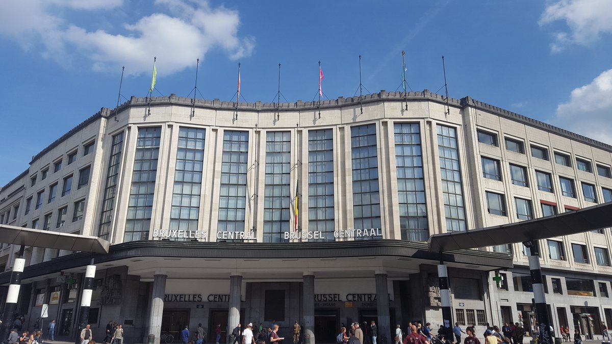 Brussels Central Station with modern architecture and trains