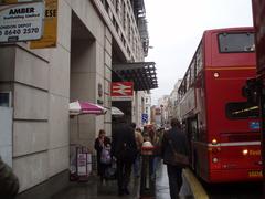 Entrance to City Thameslink railway station with stairs and glass canopy