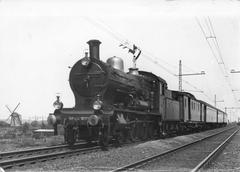 Steam locomotive nr 3777 series 3700 3800 of the NS with international coaches as D-train Edelweis near Laan van N.O. Indië in The Hague