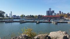 Scenic view of Milliken State Park and Harbor in Michigan with lush green trees and calm water