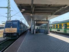 Budapest Kelenföld railway station platform with trains and people