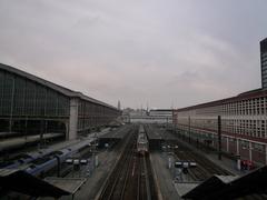 Exterior view of Lille Flandres train station showing the footbridge and entrance