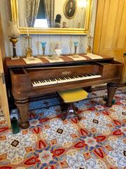 Elegant parlor room at William Howard Taft National Historic Site in Cincinnati with antique furniture and historic decor