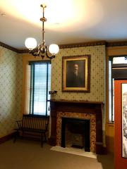 Bed and furnishings in Peter and Sylvia Taft Bedroom at William Howard Taft National Historic Site in Cincinnati