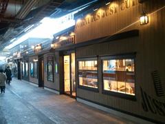 Exterior view of QB House barbershop at Nishi-Kokubunji Station