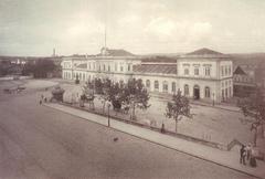 Porto-Campanhã Train Station exterior with historic rail lines visible in street