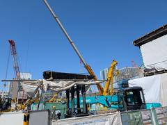 Construction site around Shinagawa Station in Takanawa Gateway City with cranes and buildings