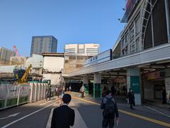 Construction site with cranes and modern buildings in Shinagawa, Takanawa Gateway City, Tokyo
