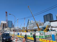 Construction site around Shinagawa, Takanawa Gateway City with cranes and buildings in progress