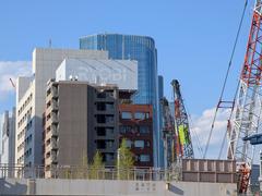 Construction site around Shinagawa in Takanawa Gateway City with modern buildings and cranes