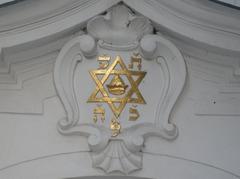 Jewish symbol on building facade in Josefov district Prague