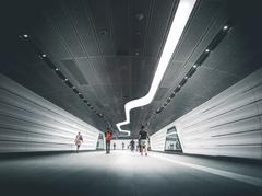 Wynyard Station entrance in Sydney with modern architecture and people walking