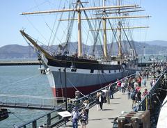 Three-masted sailing ship Balclutha moored at Hyde Street Pier on San Francisco Bay